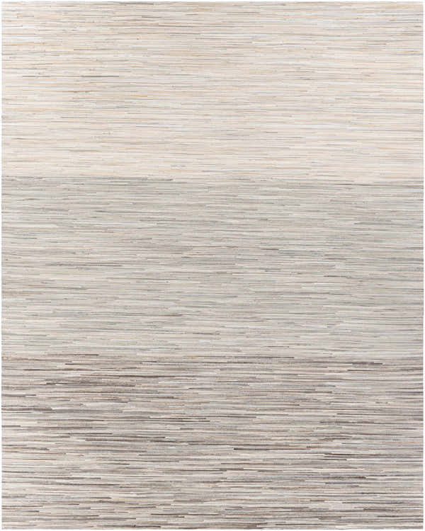 Close-up of the Karabar Premium Area Rug. Hand-crafted hair on hide rug in beige, brown, and gray horizontal stripes. Design-Rectangle-810