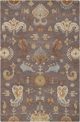 Close-up of the Kelty Area Rug. Hand-hooked wool rug in beige, burnt orange, gray, and blue with a traditional pattern. Design-Rectangle-58
