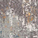 Close-up of the Kenedy Carved Statement Carpet. Features a contemporary design with blue, orange, gray, and ivory hues. Swatch