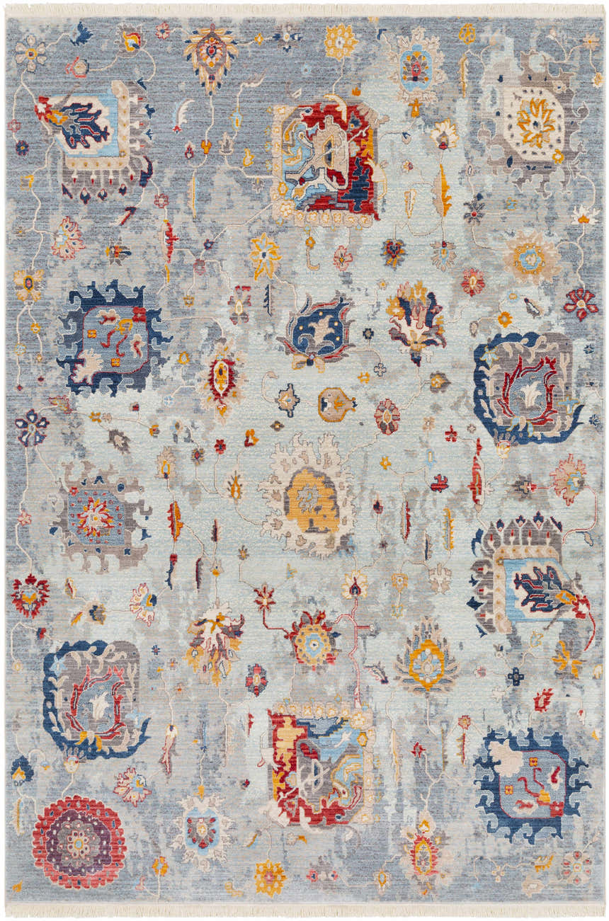 Detailed view of the Kernersville Area Rug, a vintage style rug in blue, orange, and gray with a traditional floral pattern. Design-Rectangle-579