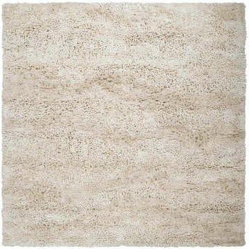 Close-up of the Kettering Solid Cream Wool Shag Rug showing its soft, textured shag pile and subtle cream color variations. Design-Square-8