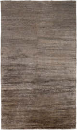 Close-up of the hand-knotted Kingwood Area Rug. Dark and light brown viscose fibers create a textured, transitional design. Design-Rectangle-58