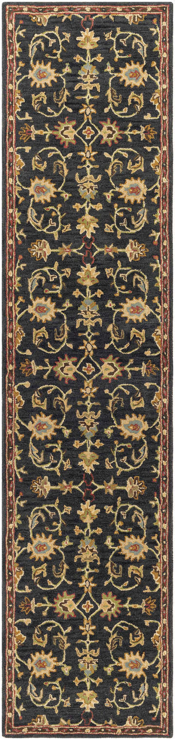 Close-up of the Kittredge Floral Black Wool Rug, showing the detailed floral pattern in tan, burgundy, and blue. Design-Runner-310