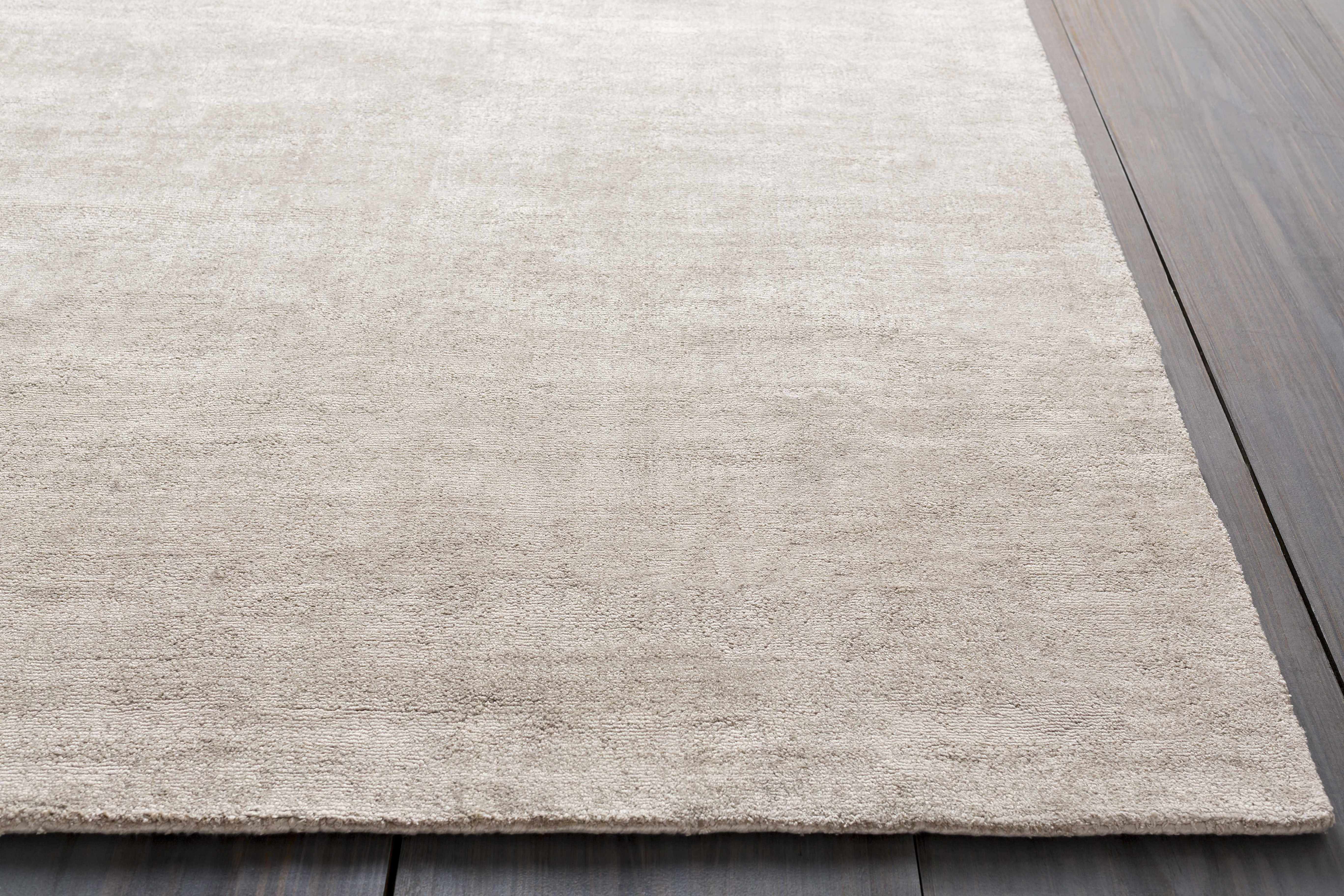 Reverse side of Kitzmiller Viscose Area Rug - Clearance, focusing on underside structure and material.Contemporary Area Rug Backing Canvas 