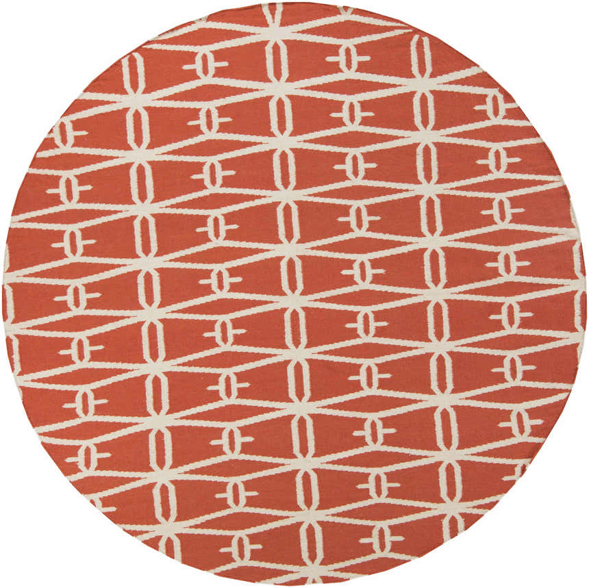 Close-up of the round Kellogg Area Rug. Coral and peach rug with a hand woven geometric pattern. Design-Round-8