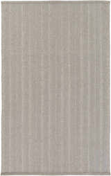 Close-up of the Kempston Gray hand woven rug. The rug has a subtle vertical stripe pattern and woven texture. Design-Rectangle-576