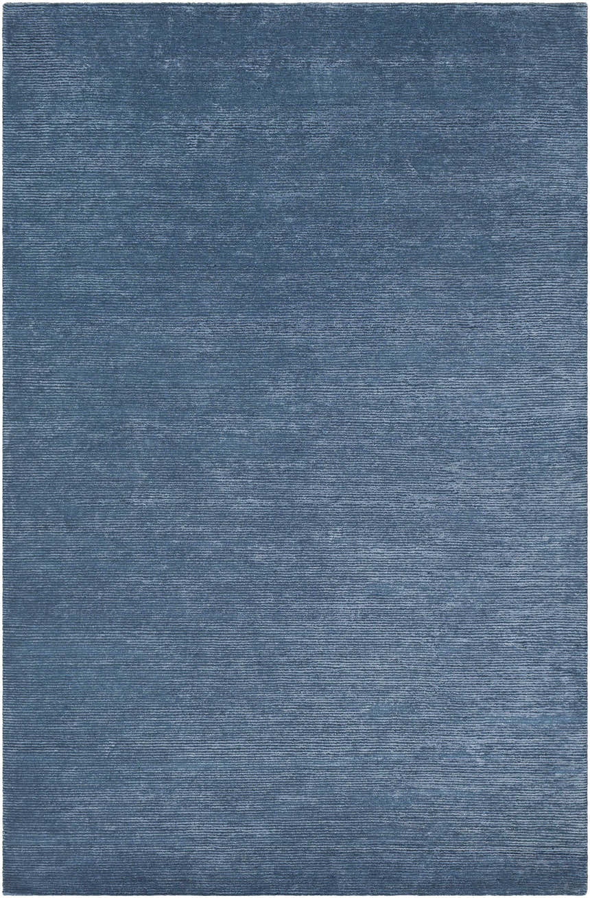 Close-up of the blue Kendall Carpet. Hand-knotted rug made of wool and viscose with a subtle horizontal stripe pattern. Design-Rectangle-576