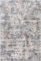 Close-up of the Kearny Area Rug: a contemporary, machine-woven rug in brick red, brown, charcoal, beige, and gray. Design-Rectangle-573
