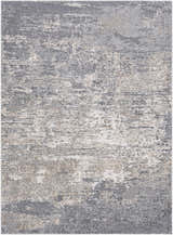Close-up of the textured Kyabram Area Rug. Colors include beige, charcoal, gray, medium brown, and off white. Design-Rectangle-5373