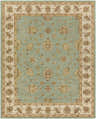 Close-up of the Lagrange Sage Regency Wool Carpet, featuring a sage green field and beige floral border. Design-Rectangle-7696