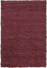 Close-up of the Lakota Area Carpet. Charcoal wool shag rug with a geometric pattern and fringed edges. Design-Rectangle-58