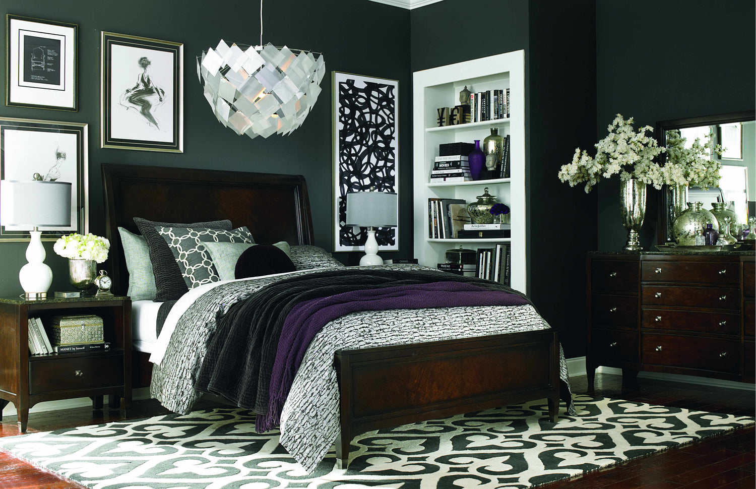 Bedroom with dark walls, wood furniture, and a black and cream Landa Area Rug. Roomscene-Rectangle