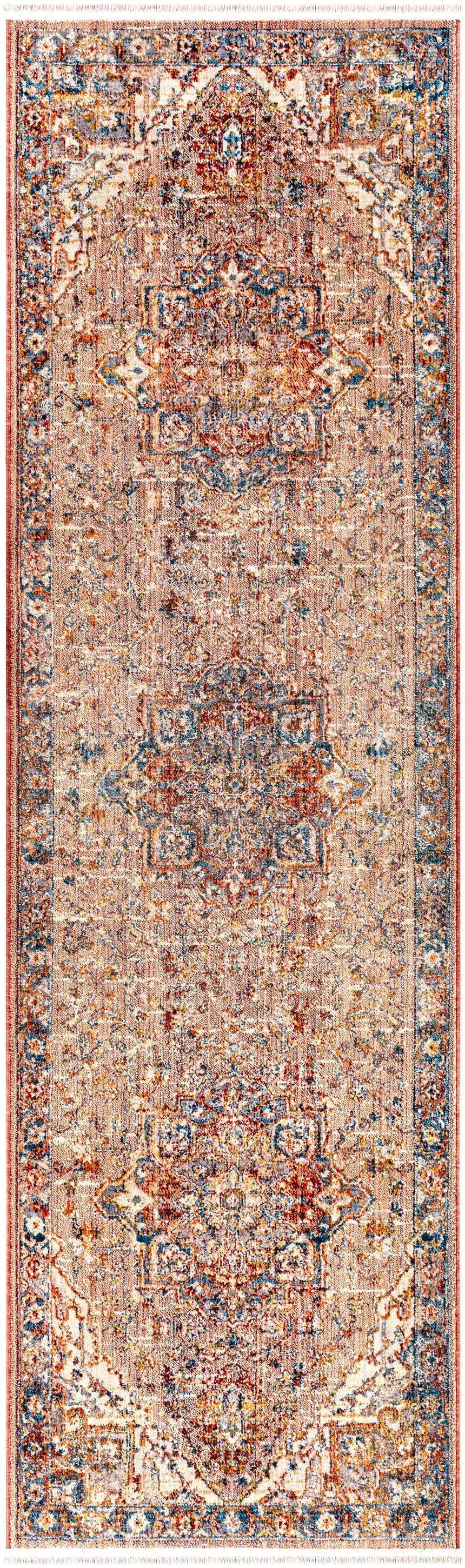 Close-up of the Lappe Area Rug. Bohemian style rug with cream, blue, peach, and rust colors and a traditional pattern. Design-Runner-279