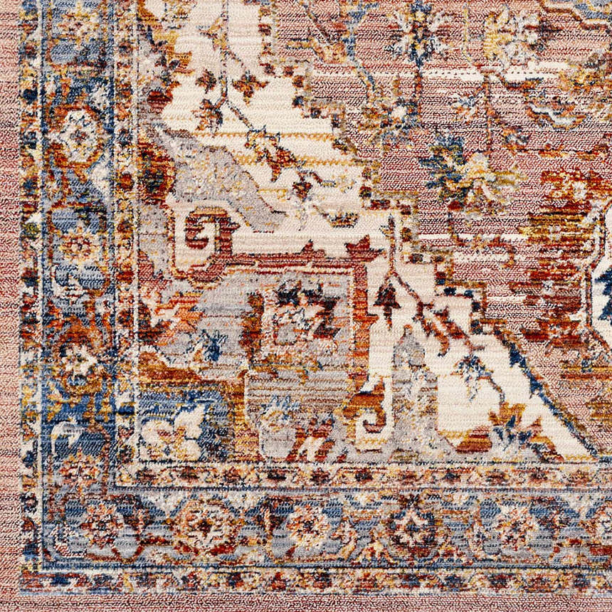 Close-up of Lappe Area Rug: Bohemian-style rug with cream, blue, rust, and gray oriental pattern. Machine woven polyester. Swatch