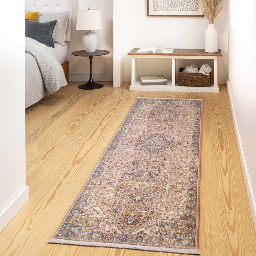 Bedroom scene with Lappe Area Rug runner in cream, blue, and rust colors on light wood floor. Traditional, bohemian style. Roomscene-Runner