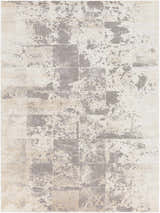 Close-up of the Lares Area Rug. Machine-woven rug with a contemporary animal pattern in charcoal, light beige, medium gray, and tan. Design-Rectangle-710103