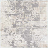 Close-up of the Lares Area Rug. Charcoal, light beige, medium gray, and tan abstract pattern. Machine woven texture. Design-Square-710