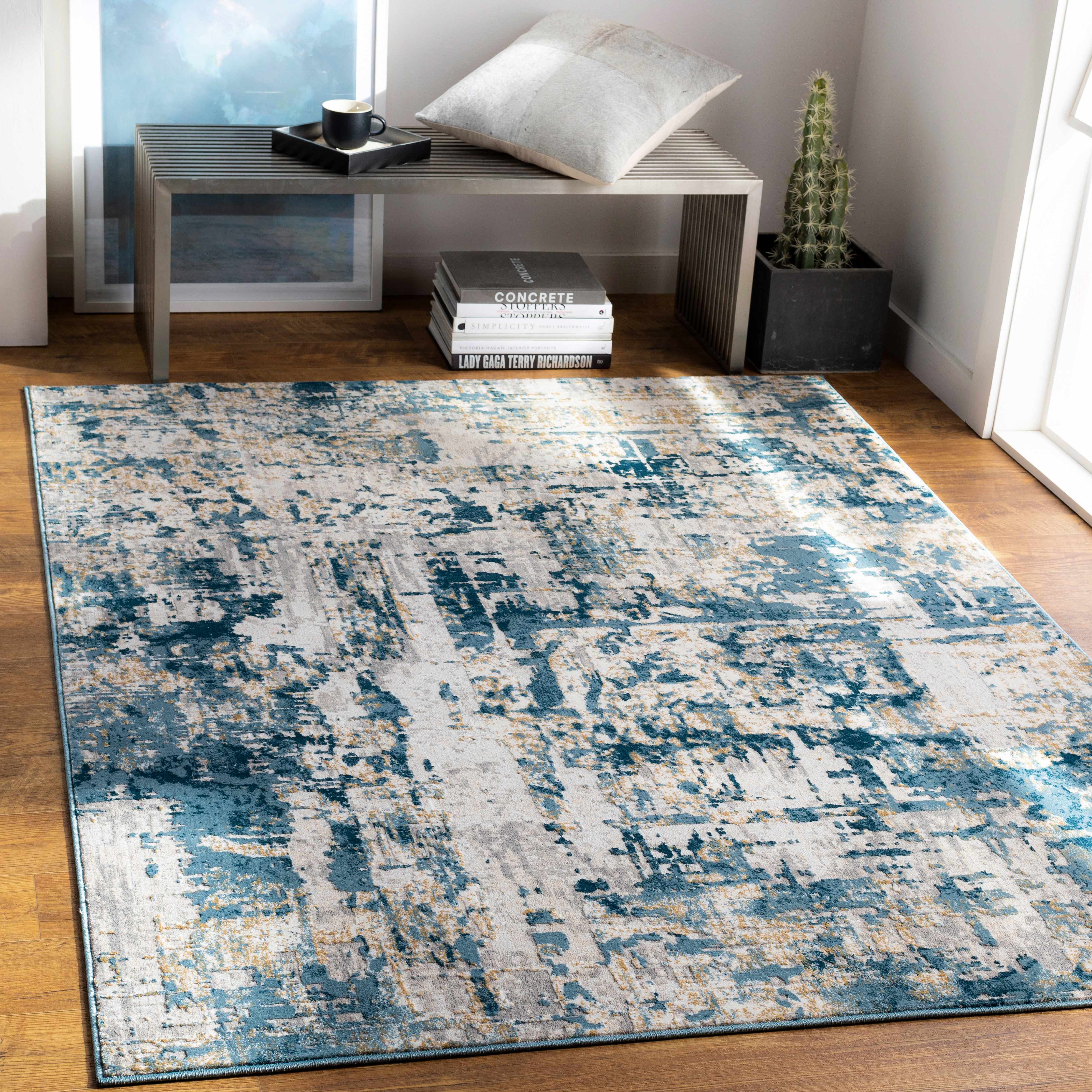Larne Area Rug - Clearance placed in a styled room setting, harmonizing with surrounding room decor. Contemporary Area Rug Backing  