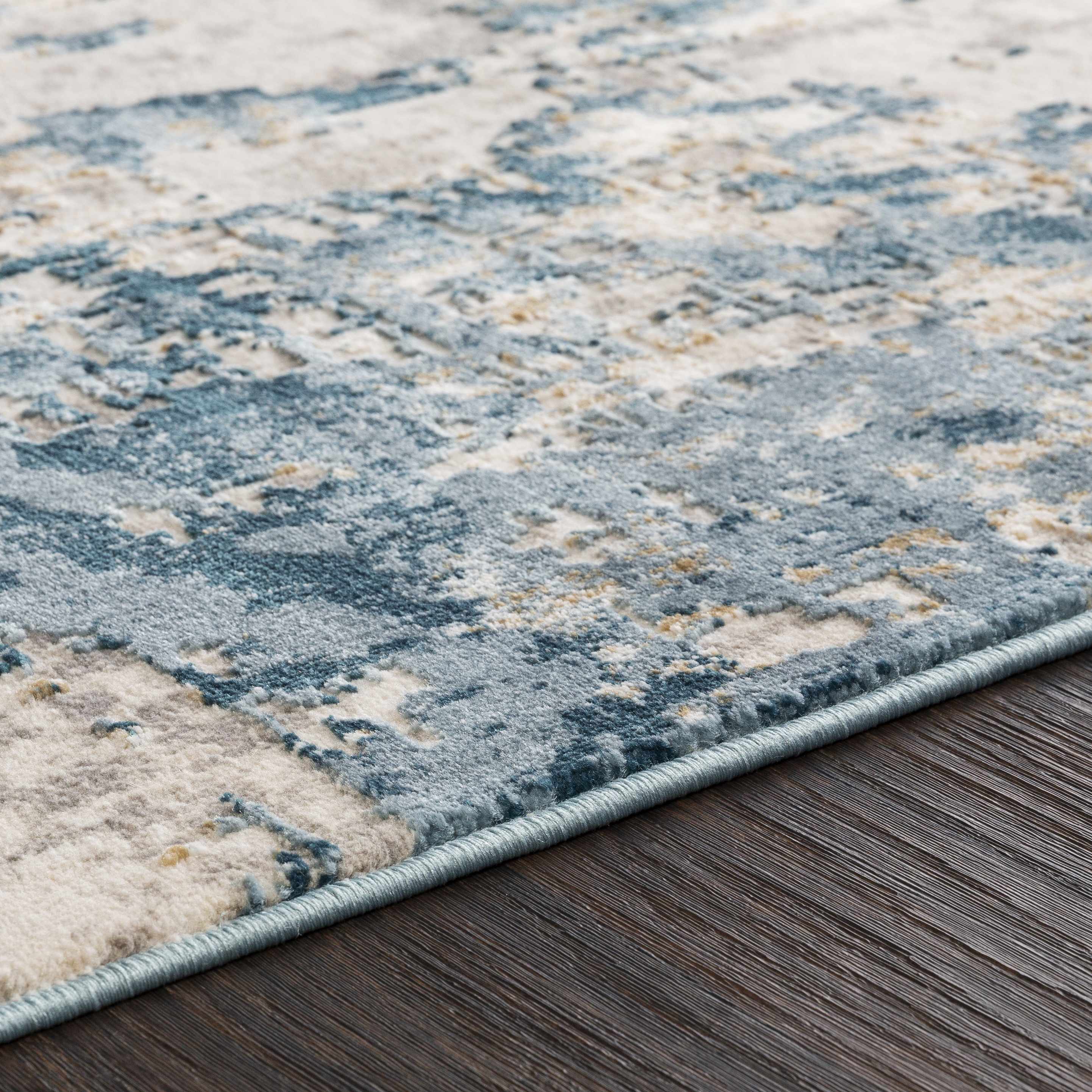 Close-up of the texture on Larne Area Rug - Clearance, showing fabric weave and feel. Contemporary Area Rug Backing  