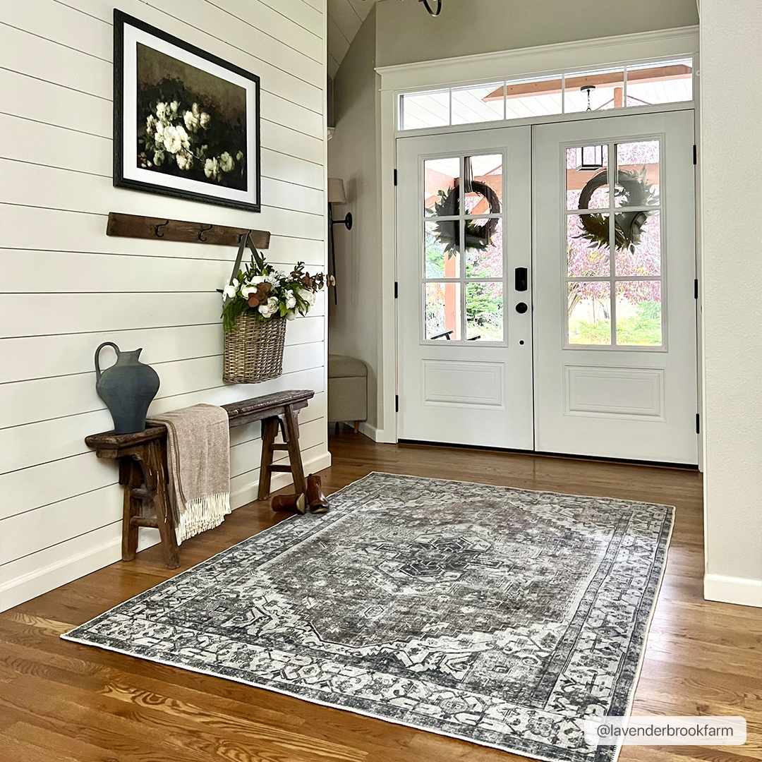 Farmhouse entryway with Athor Washable Rug in dark gray. Rustic bench, shiplap wall, and double doors create a welcoming scene. Roomscene-Rectangle
