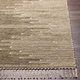 Close-up of the hand woven Lucasville Area Rug. Tan and cream cotton rug with fringe detail. Contemporary, farmhouse style. Front