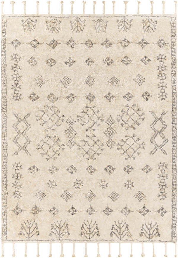 Close-up of the hand woven Lebeau Area Carpet. Cream rug with gray geometric and tree pattern, and braided tassels. Design-Rectangle-810