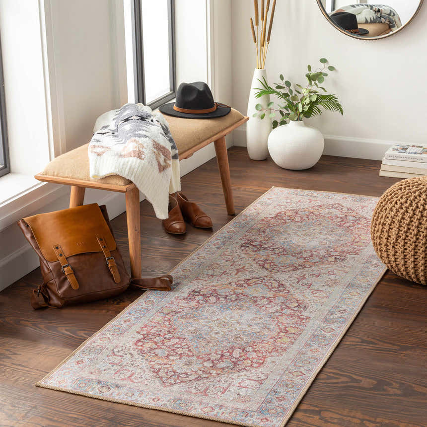 Entryway with Cream Rust Leeston Washable Rug runner, wood floors, bench, backpack, and boho pouf. Roomscene-Runner
