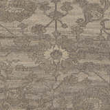 Close-up of the Lerwick Carpet showing its beige and charcoal floral pattern and hand-knotted wool texture. Swatch