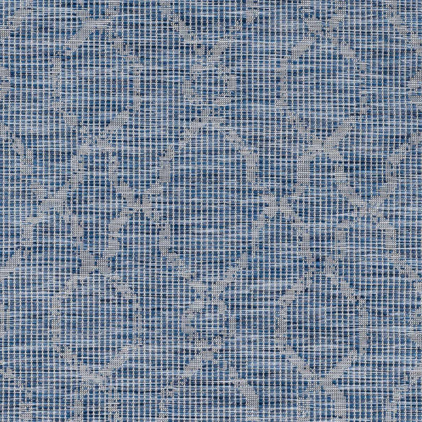 Close-up of the Lidlington Flatweave Area Carpet. Blue and dark blue polypropylene rug with a subtle geometric pattern. Swatch