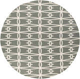 Close-up of round Lipan Area Rug. Hand woven wool rug in charcoal and peach with a contemporary geometric pattern. Design-Round-8