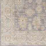 Close-up of the Coby Brown Avant Garde rug, showing its traditional pattern, brown, gray, and dusty sage colors, and thick texture. Swatch