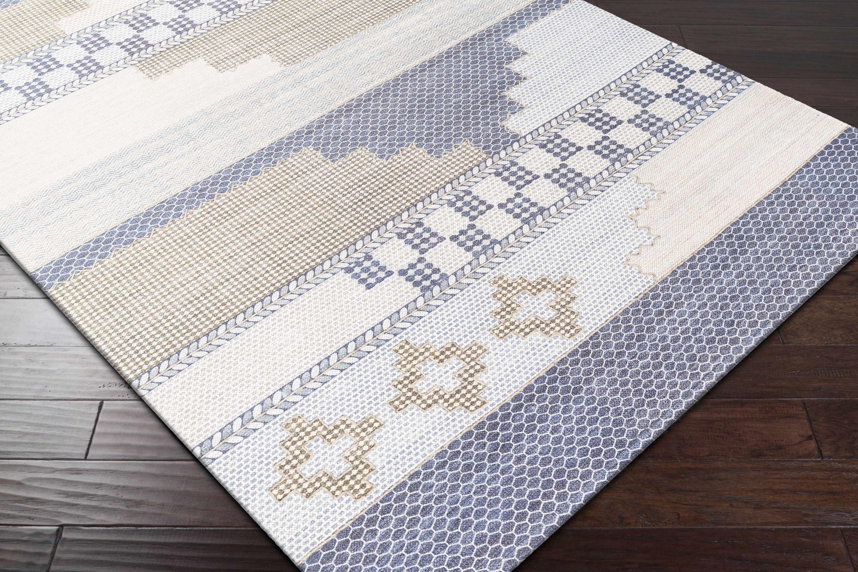 Zoomed-in view of the edge of Llansteffan Carpet - Clearance, focusing on border details and craftsmanship. Transitional,Bohemian Area Rug Backing  