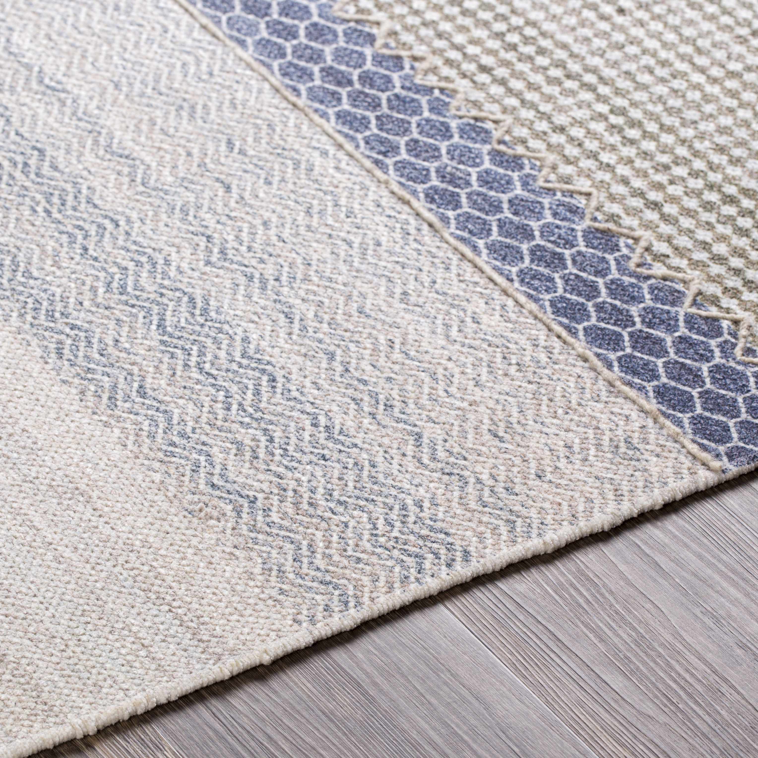 Close-up of the texture on Llansteffan Carpet - Clearance, showing fabric weave and feel. Transitional,Bohemian Area Rug Backing  