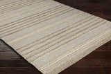 Close-up of the Allendorf Area Rug showing beige, charcoal, and cream stripes on a hand-woven wool texture. Corner