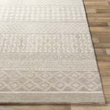 Close-up of the hand-tufted Lone Beige Tufted Maroc Wool Rug showing its geometric pattern and soft texture. Front