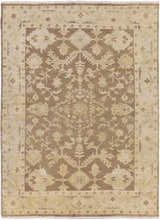 Close-up of the Lochmaben Premium Wool Rug. Hand-knotted rug in charcoal, ivory, light brown, and sage with a traditional floral pattern. Design-Rectangle-811