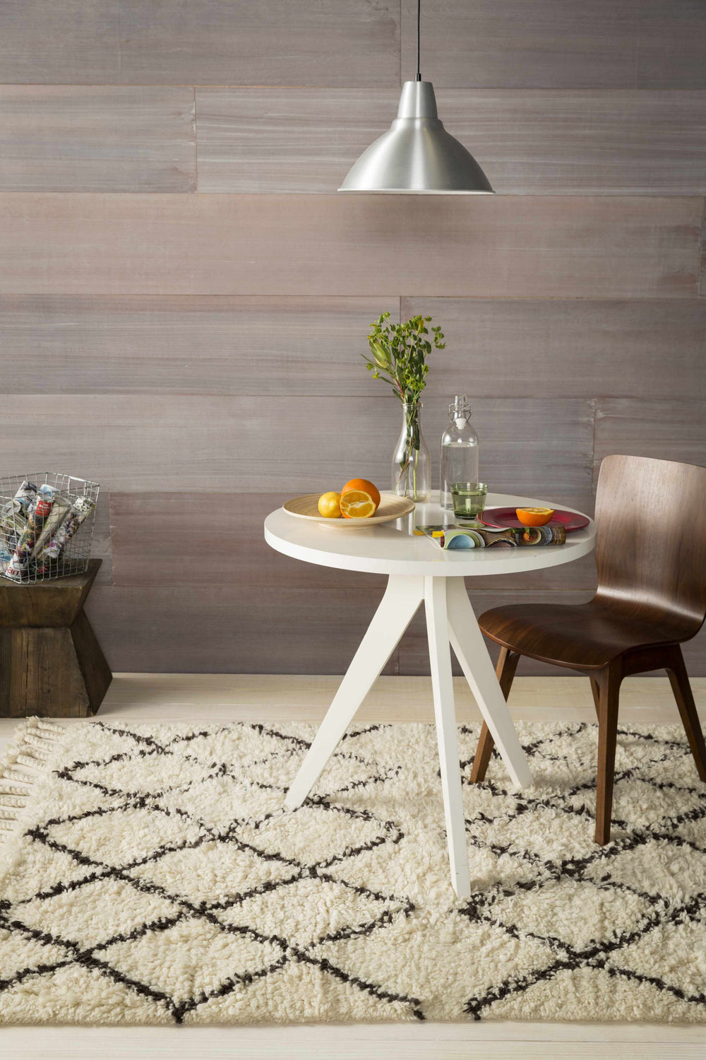 Farmhouse style room with a white table and Lothian Area Rug in charcoal and ivory. Roomscene-Rectangle