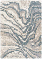 Close-up of the Lottery Area Rug, a contemporary shag rug with blue, cream, and light gray wavy pattern. Design-Rectangle-537