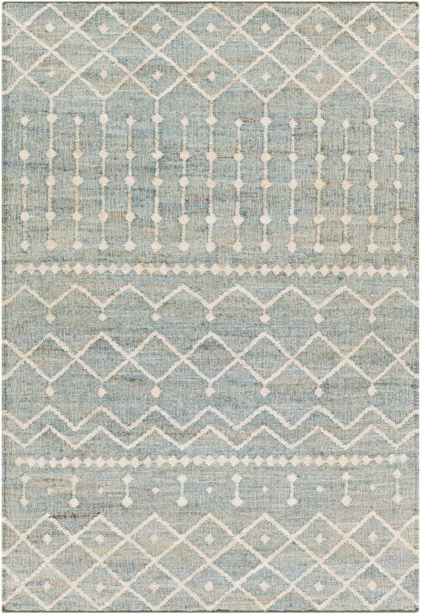 Close-up of the Lowville Jute Rug. Hand-woven rug in dusty sage with ivory geometric diamond and dotted line patterns. Design-Rectangle-576