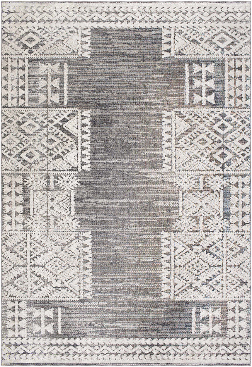 Close-up of the Luddenham Textured Outdoor Rug. Gray rug with a white geometric pattern. Farmhouse style. Design-Rectangle-5373