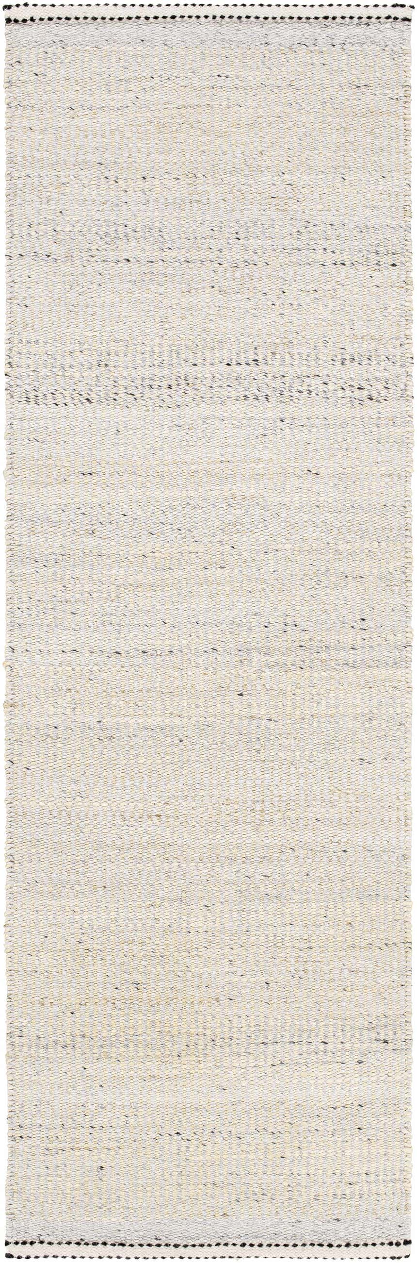 Close-up of the hand woven Lumatil Area Rug. Features black, cream, and gray jute and wool fibers. Farmhouse style. Design-Runner-268