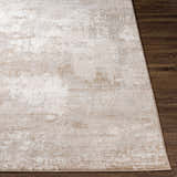 Close up of the Lumbia Distressed Embossed Area Rug, showcasing its neutral tones and subtle, textured pattern. Front