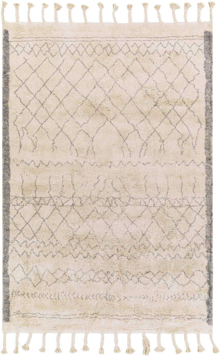 Close-up of the hand-woven Luncarty Area Rug. Cream cotton rug with gray geometric diamond and wavy line pattern and tassels. Design-Rectangle-576