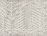 Close-up of the Lusacan Area Carpet; hand-knotted viscose rug in charcoal, gray, and off-white with a geometric pattern. Swatch