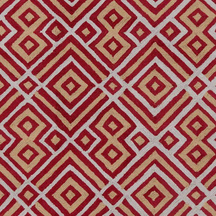 Close-up of the Loyalhanna Area Rug showing its hand-hooked texture and contemporary geometric pattern in gray, rust, and brown. Swatch