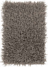 Close-up of the charcoal Morris Area Rug. Hand-woven polyester rug with a textured, shaggy pile. Design-Rectangle-23