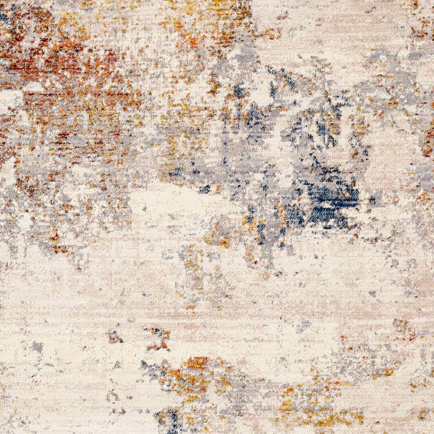 Close-up of Macayug Area Carpet showing cream, dark blue, rust, and gray abstract pattern and soft polyester texture. Swatch