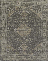 Close-up of the Macgregor Area Rug. Hand-loomed rug in charcoal, light gray, and olive with a traditional, bohemian-inspired pattern. Design-Rectangle-810