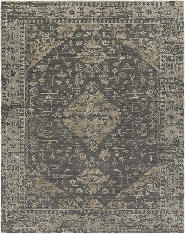 Close-up of the Macgregor Area Rug. Hand-loomed rug in charcoal, light gray, and olive with a traditional, bohemian-inspired pattern. Design-Rectangle-810