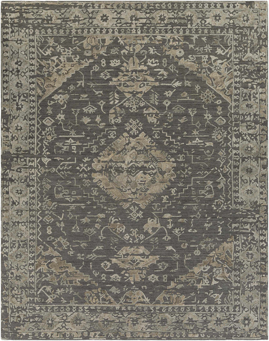 Close-up of the Macgregor Area Rug. Hand-loomed rug in charcoal, light gray, and olive with a traditional, bohemian-inspired pattern. Design-Rectangle-810